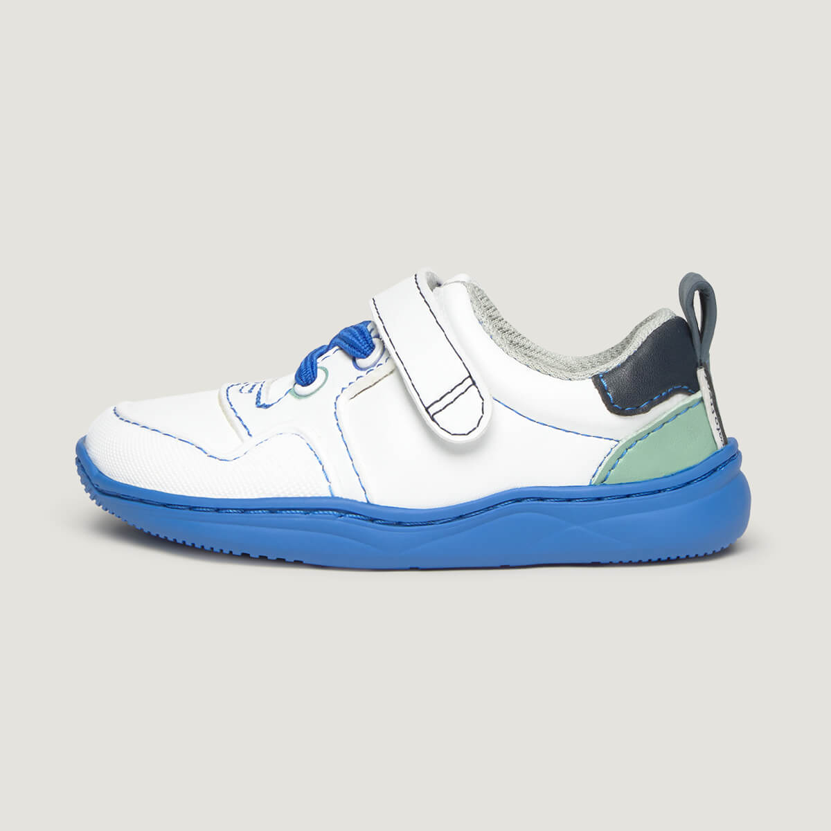 Lateral Olocau Feroz | Blanco Azul Royal Microfibra