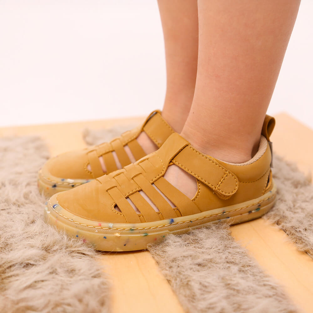 sandalia trenzada respetuosa infantil tabarca rocker mostaza ss26